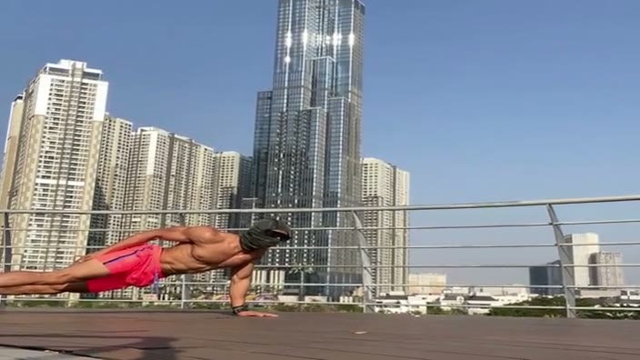 A jump-rope movement against the skyline.